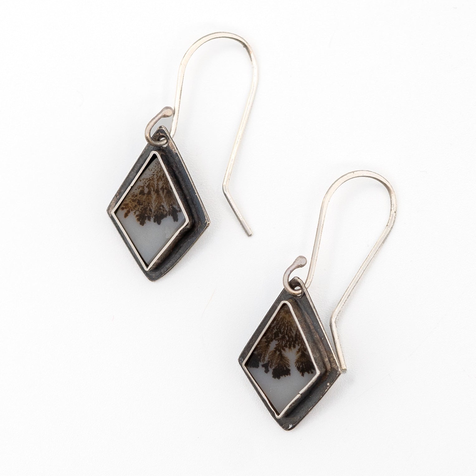 Dendritic Agates cut to diamond shapes and dangling from sterling French wires